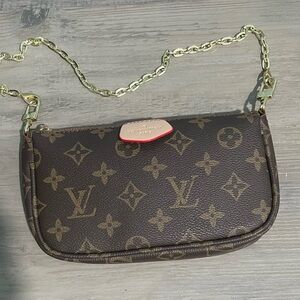 Elegant Monogram Wristlet With Gold Tone Chain